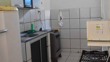 Fridge, microwave, blender, cookware/dishes/utensils