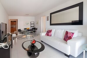 Apartment | Living area | 40-inch flat-screen TV with cable channels