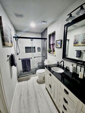 Hair dryer, towels, soap, shampoo