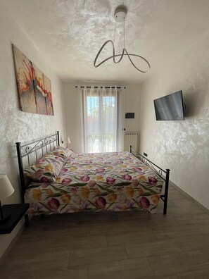 2 bedrooms, in-room safe, iron/ironing board, travel cot
