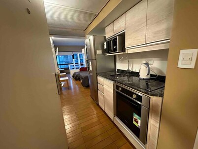 Departamento con cocina en el centro