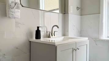 Hair dryer, towels, soap, shampoo
