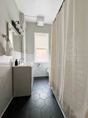 Hair dryer, towels, soap, shampoo