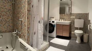 Hair dryer, towels, soap, shampoo