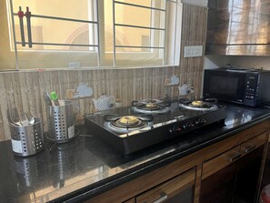 Fridge, microwave, stovetop, toaster - The 2 BHK Flat - AIG-Gachibowli (Hyderabad (Telangana), Telangana, India)