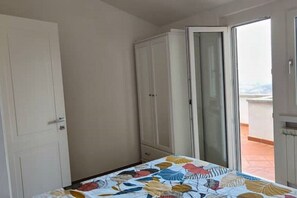 2 bedrooms, desk, iron/ironing board, travel cot