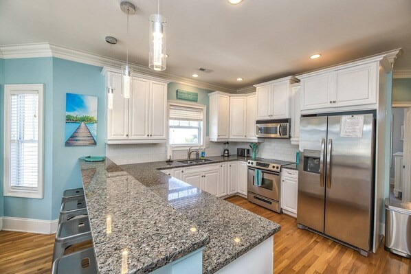 Fridge, microwave, oven, stovetop - Spacious 6-bedroom ocean view home, 1 minute walk to beach!  (Carolina Beach)