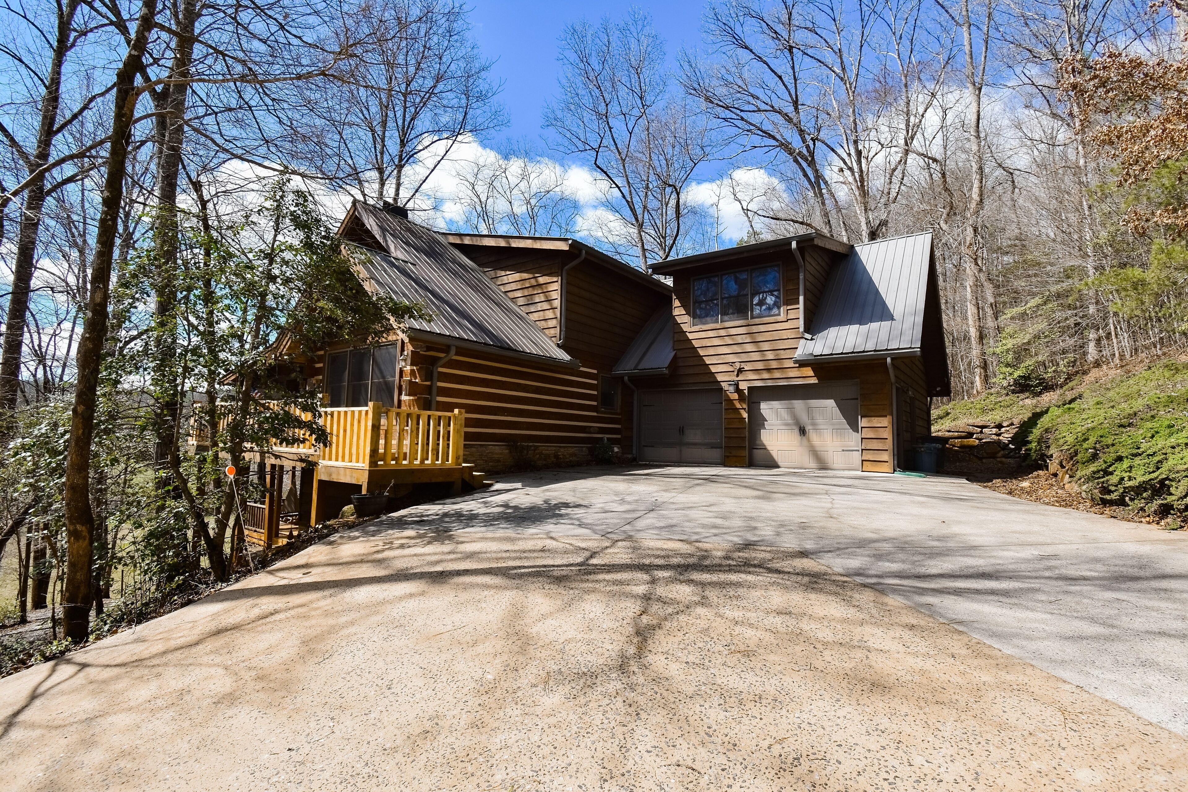Stunning creek-view home with private hot tub, 2 fireplaces, game room, firepit