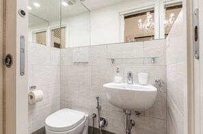 Hair dryer, bidet, towels, soap