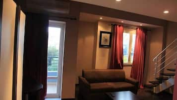 Suite junior | 1 dormitorio, minibar, espacio para trabajar con un portátil