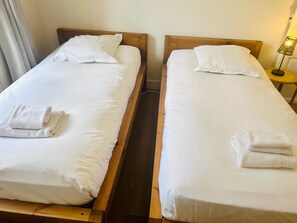2 chambres, fer et planche à repasser, Wi-Fi, draps fournis