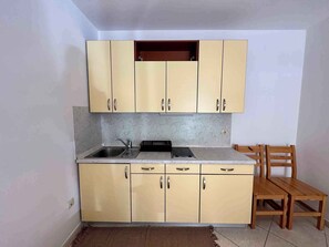 Fridge, stovetop, cookware/dishes/utensils