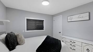 2 bedrooms, desk, iron/ironing board, travel crib