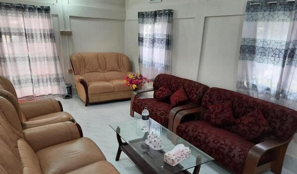 Family Double Room, Pool View | Living area | 32-inch LED TV with satellite channels