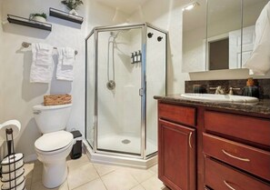 Shower, hair dryer, towels, soap