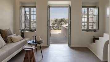 Deluxe Suite, City View | Living area | 32-inch Smart TV with satellite channels, Netflix, streaming services