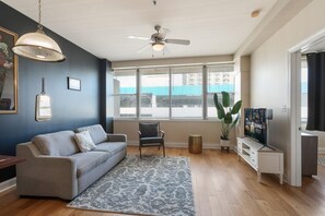 TV - NOLA Skyline Bliss: City Chic 1BR Condo with Rooftop Pool (New Orleans)