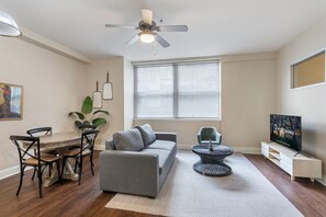 TV - Cityscape Escape: Chic Living in 1BR Condo with Pool (New Orleans)