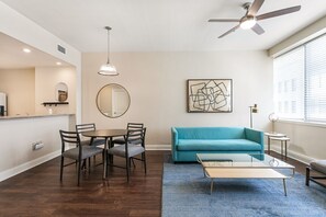 TV - French Quarter Sanctuary: Stylish 1BR Condo with Pool Retreat (New Orleans)