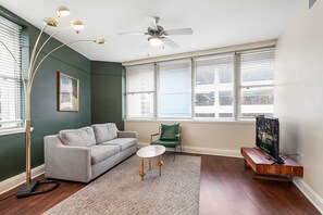 TV - Cityscape Chic: Elegant 1BR Condo with Rooftop Pool (New Orleans)