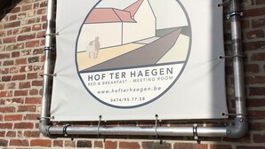A signboard for Hof Ter Haegen, indicating a meeting room with bed & breakfast services, contact information, and a website URL. - B&B Hof ter Haegen (Galmaarden)