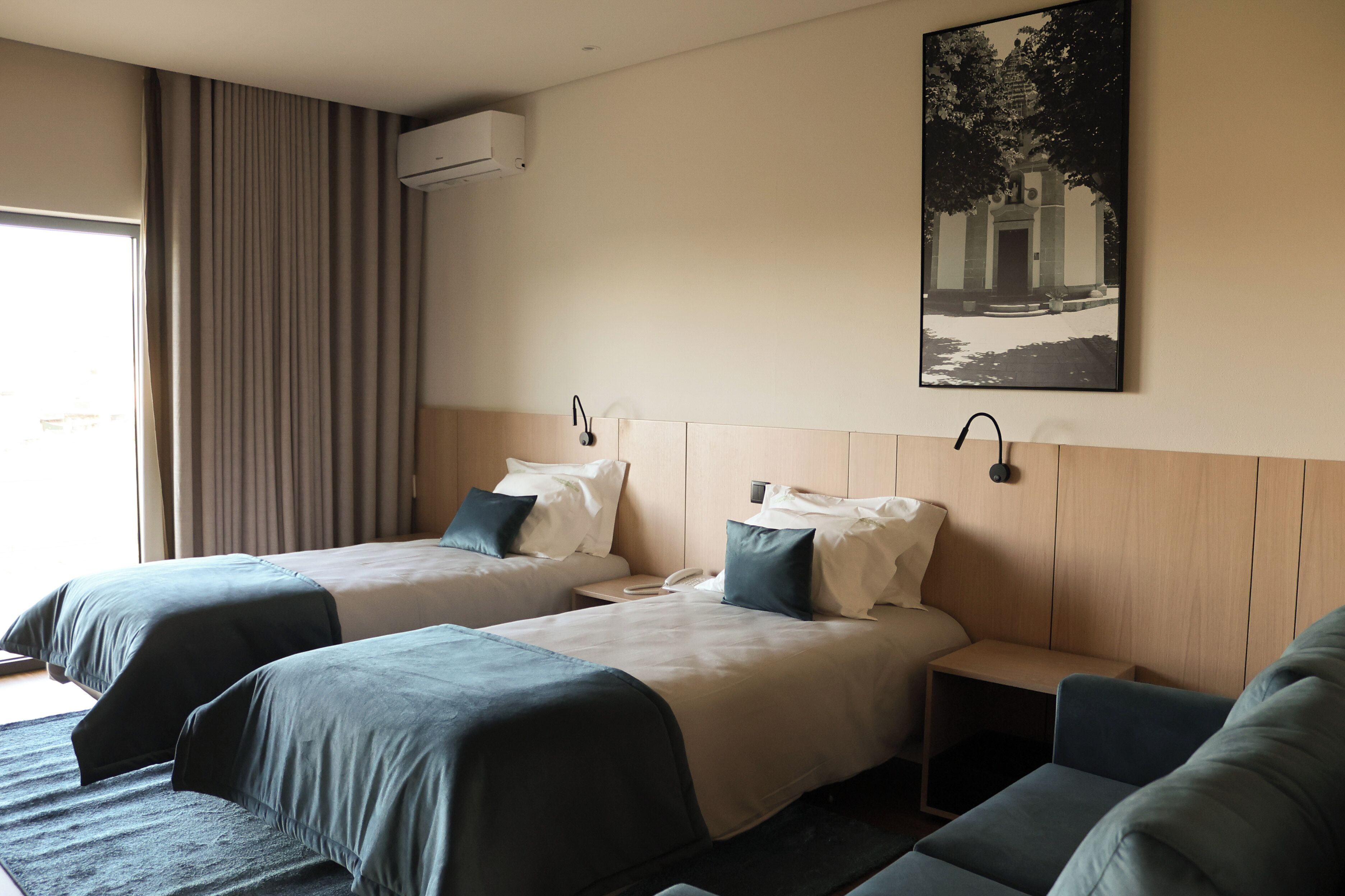 Deluxe Double or Twin Room | Desk, laptop workspace, blackout curtains, free WiFi