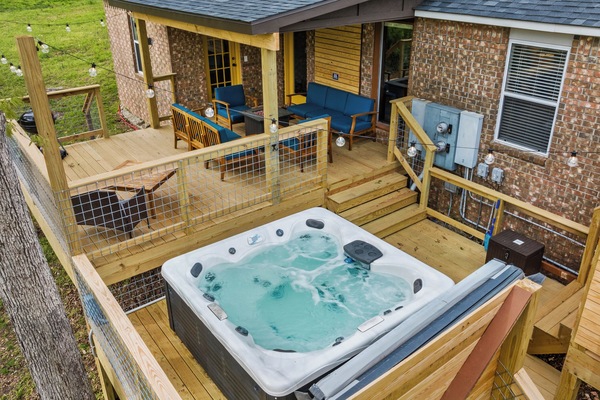 Private decks, hot tub, tabletop fire pit, & views of the bike trails!