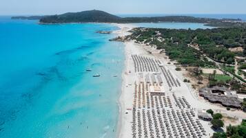 Private beach, white sand, sun-loungers, beach umbrellas