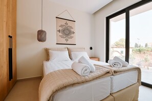 2 quartos, cofres nos quartos, ferros/tábuas de passar roupa