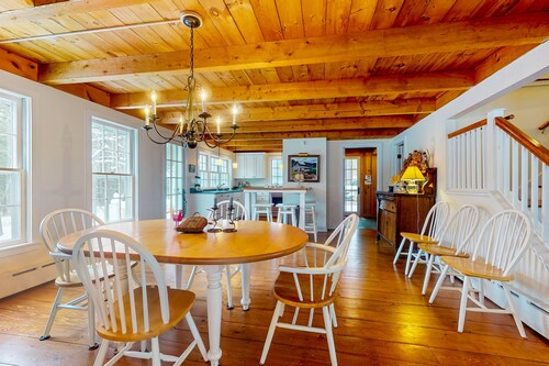 Picturesque creekside home with gorgeous deck & sunroom, near 4 ski mountains