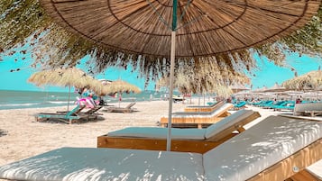 Private beach, beach massages, beach volleyball, 2 beach bars