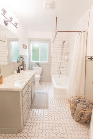 Hair dryer, towels, soap, shampoo