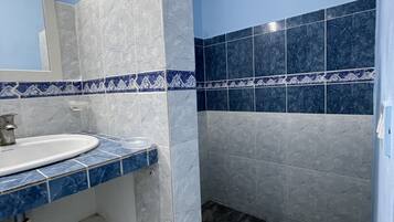 Hair dryer, towels, soap, shampoo