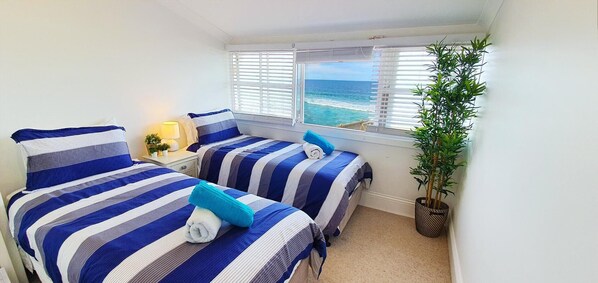 2 chambres, fer et planche à repasser, Wi-Fi, draps fournis