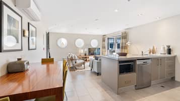 Design Apartment | Private kitchen | Full-size fridge, microwave, oven, stovetop