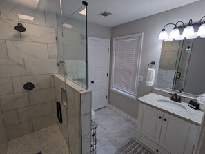 Shower, hair dryer, towels, soap