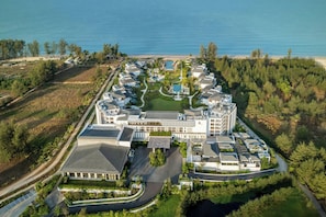 An aerial view of a resort with a central building, a pool, and a beach. - Khao Lak Marriott Beach Resort and Spa  (Takua Pa)