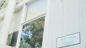 A building with a sign reading "The White House Studio".