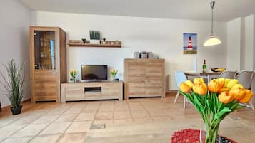 TV, mesa de pingue-pongue, aparelho de som