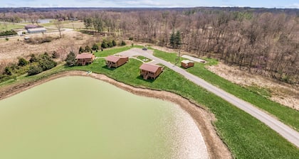 Dog-friendly, lakefront cabin with porch & firepit - near wineries & trails