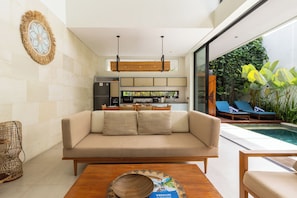 Villa | Living room | 20-inch flat-screen TV with cable channels - Nivassa Villa by Betterplace (Canggu)