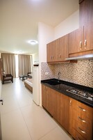 Classic Studio | Private kitchen | Mini-fridge, stovetop, cookware/dishes/utensils, paper towels