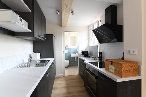 Ferienwohnung 'Das Schiefe Haus Whg Weinlage' mit WLAN