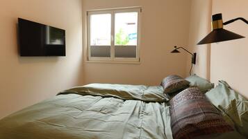 2 quartos, ferros/tábuas de passar roupa, Wi-Fi de cortesia