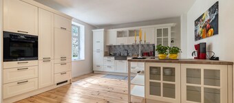 Holiday Apartment 'Suite with Conservatory' with Mountain View, Directly on the Swimming Lake and Wi-Fi