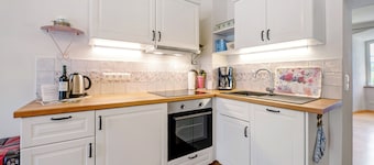 Appartement 'Kristallzimmer - Studio' met privé terras, gedeelde tuin en Wi-Fi