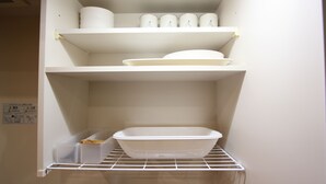 A storage area with shelves and a rack. - LUANA Koenji (Tokyo)