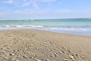 On the beach, beach towels, fishing