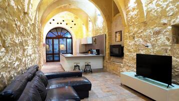 21-inch flat-screen TV with cable channels, TV