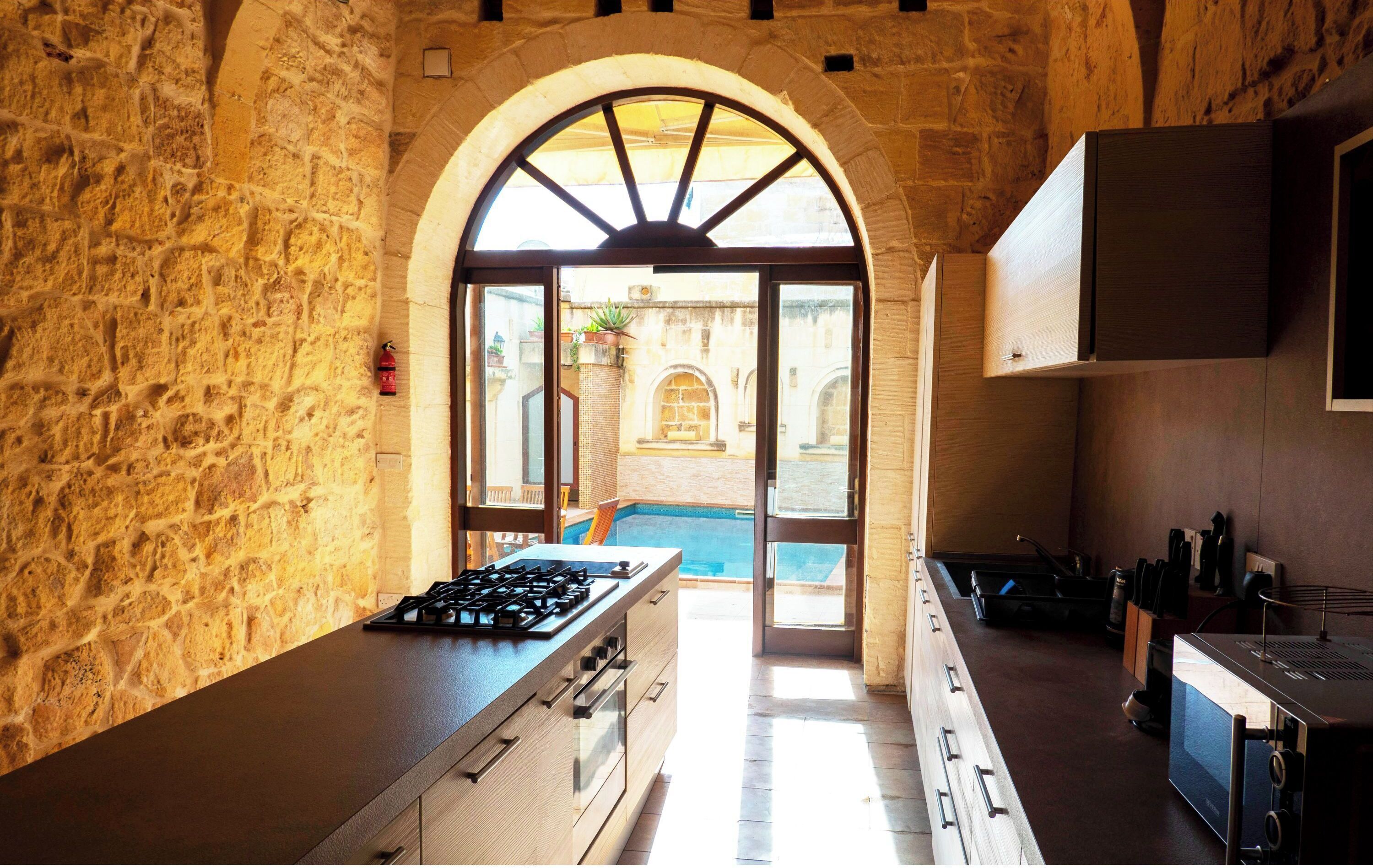 Family House, Multiple Bedrooms (Mixel Gozitan Villa and Pool) | Private kitchen | Fridge, microwave, oven, stovetop
